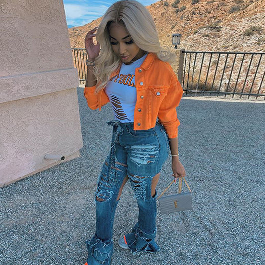 Women’s denim jacket by Ancient Energy featuring a casual, cropped streetwear style with fitted bodycon design and outwear features.