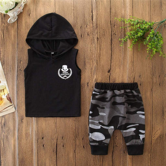 Two-piece toddler boys' sleeveless hooded T-shirt and camo pants outfit by Ancient Energy, featuring casual, comfortable clothing for kids.