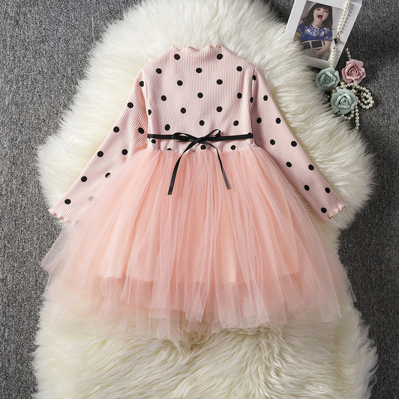 Baby girl in a long-sleeve lace tutu dress by Ancient Energy, perfect for spring, winter, birthday, or christening celebrations.