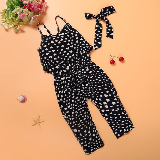 Kids girls' summer clothing set by Ancient Energy featuring a sleeveless cotton polka dot jumpsuit with straps for children.