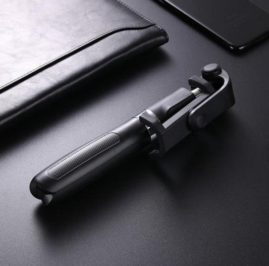 Ancient Energy Apple-compatible tripod selfie stick with Bluetooth remote for smartphones, adjustable with secure grip.