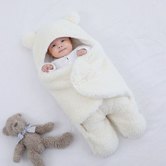 Baby quilted sleeping bag wrapper by Ancient Energy, soft and cozy for infants, with a quilted pattern and snug fit.
