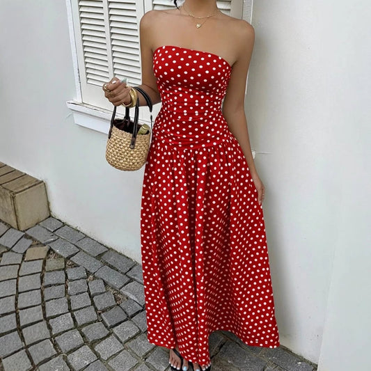 Elegant polka-dot off-shoulder dress by Ancient Energy featuring a strapless, high-waist design for party, beach, or holiday wear.