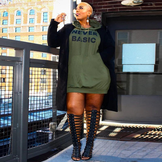 Plus size hooded hoodie for women by Ancient Energy, featuring a comfortable, oversized fit and casual blouse-style design.