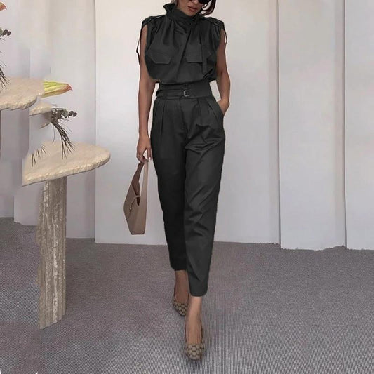 Ancient Energy shoulder slimming waist belt paired with a stylish blouse and pants, showcasing a modern fashion look.