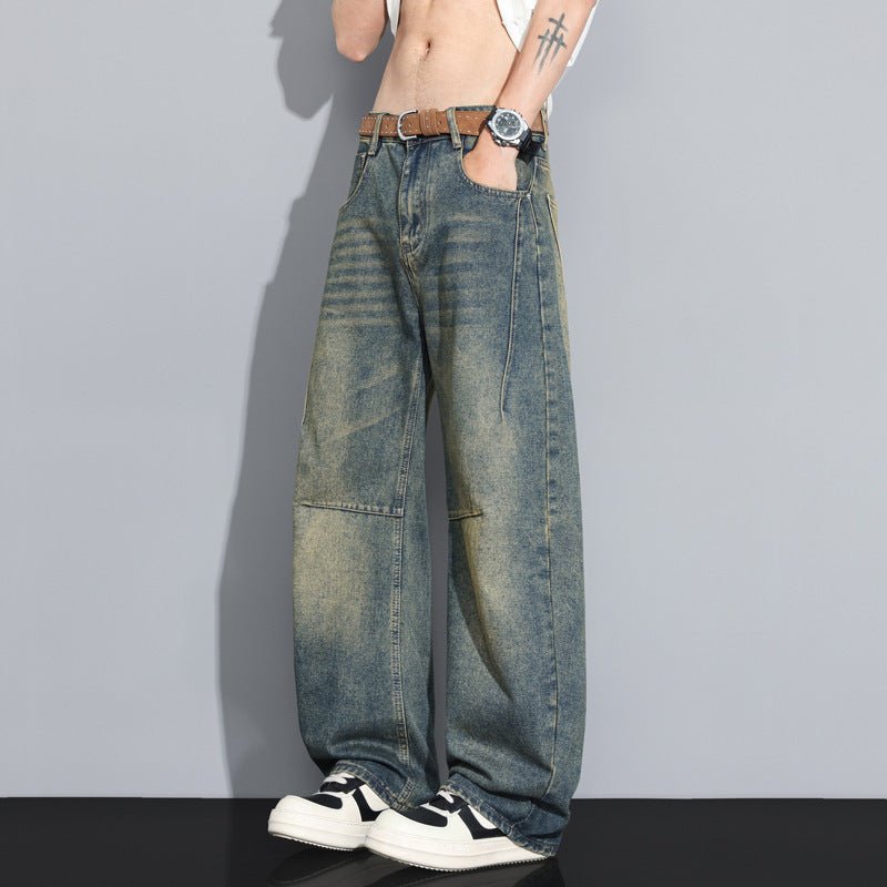 Ancient Energy men's straight-leg denim jeans with a versatile high-street style, shown folded on a neutral background.