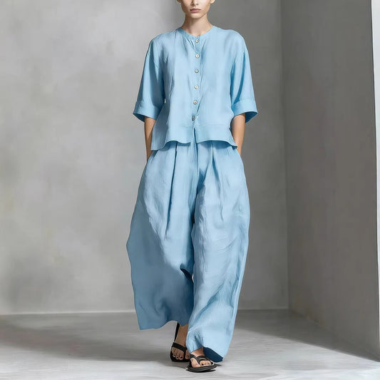 FitiqueFit three-quarter sleeve shirt and loose trousers two-piece set, casual stylish clothing for women.