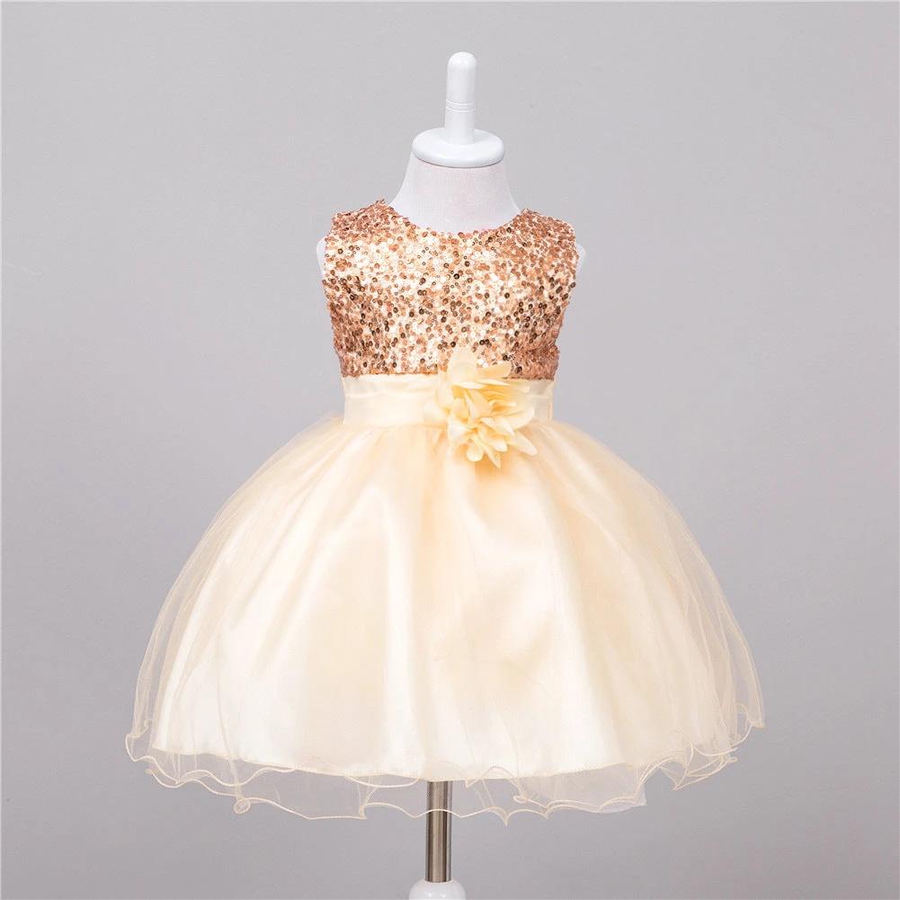 Baby sequin dress by MANDOTOS featuring flower girl style, perfect for wedding and princess-themed occasions.