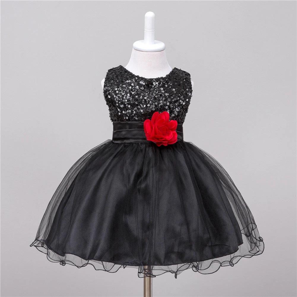 Baby girl sequin dress by MANDOTOS featuring floral accents, perfect for flower girl or princess wedding occasions.