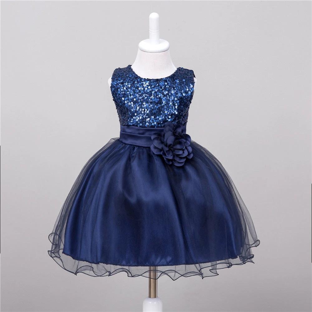 Baby girl sequin dress by MANDOTOS, flower girl wedding princess dress with floral details and shiny sequin embellishments.