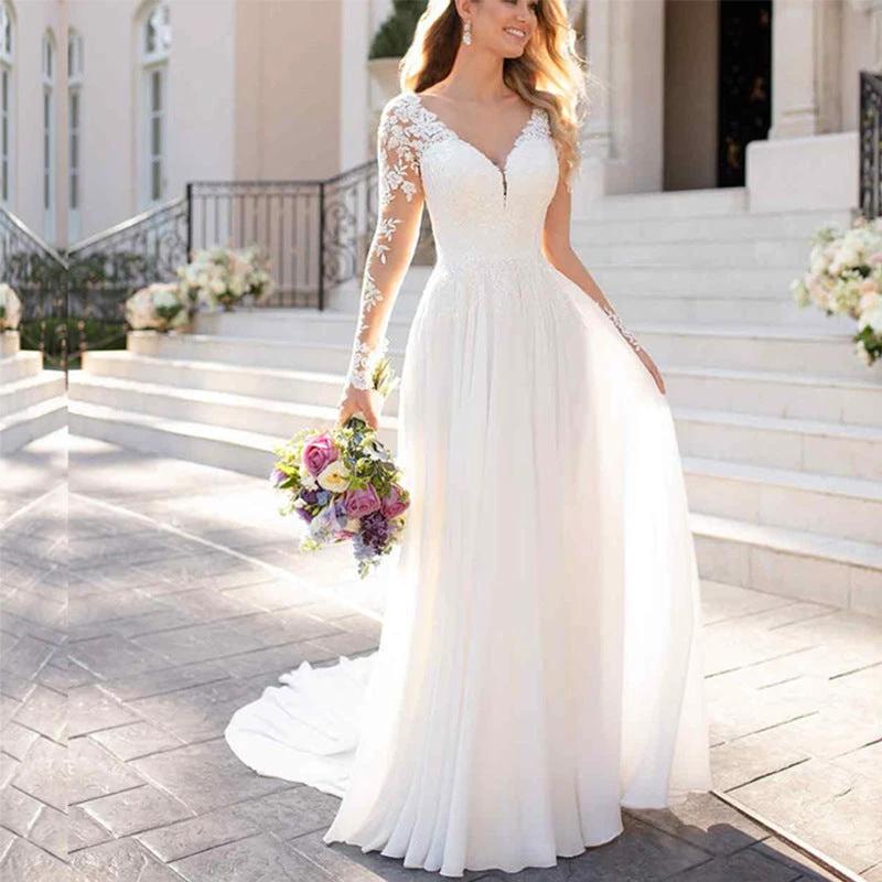 White backless deep V-neck wedding dress for women by MANDOTOS, elegant evening gown with fitted silhouette and stylish design.
