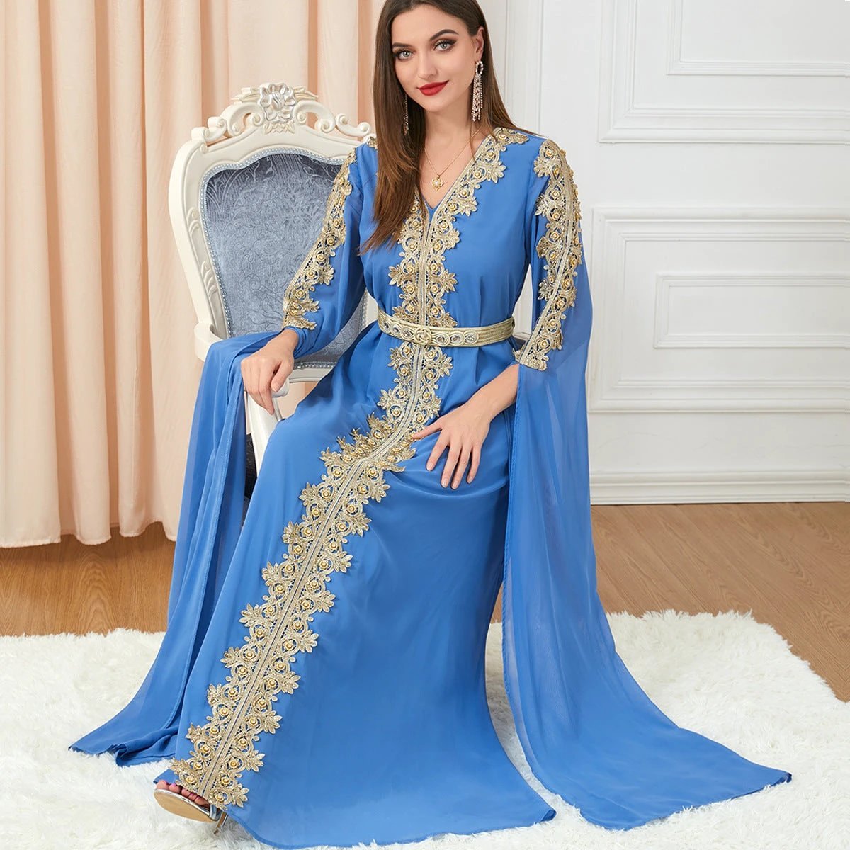 Women's spliced skirt dress with extra long sleeves by MANDOTOS, featuring a stylish and elegant design.