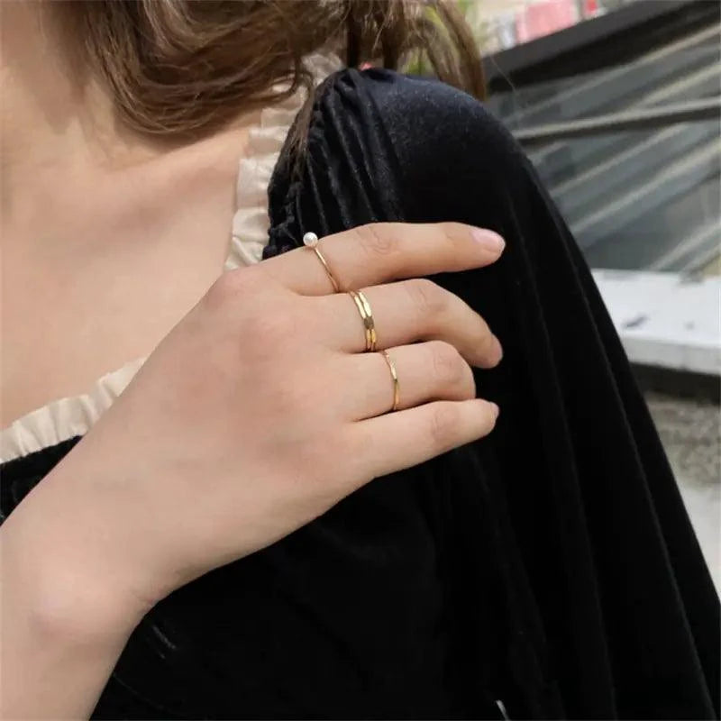 14K gold-filled textured stacking ring by MANDOTOS, close-up of shiny, hammered surface perfect for everyday jewelry wear