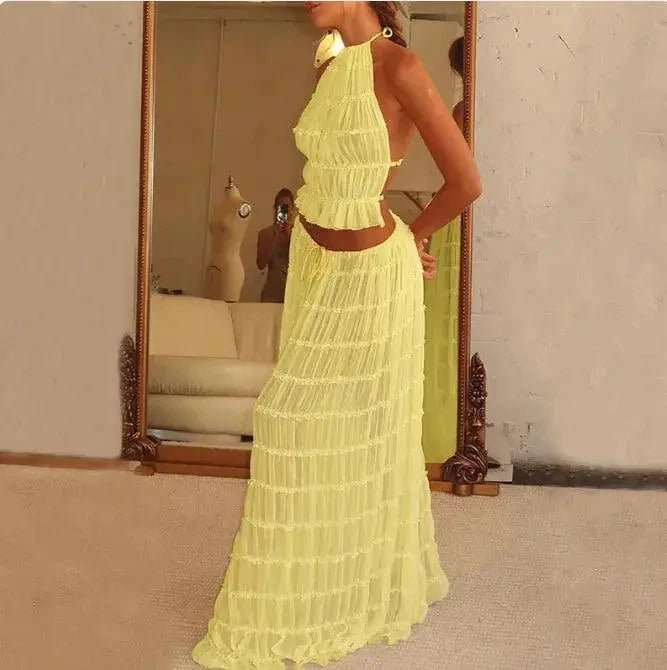Mandotos 2-piece chic halter dress suit set featuring a stylish halter top and matching skirt, perfect for elegant occasions.