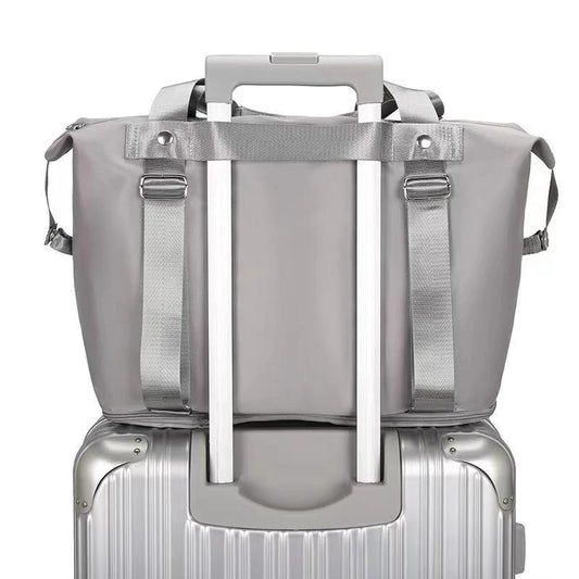 Mandotos folding travel bag for women, versatile backpack, shoulder bag, gym, fitness, weekender, and overnight use.