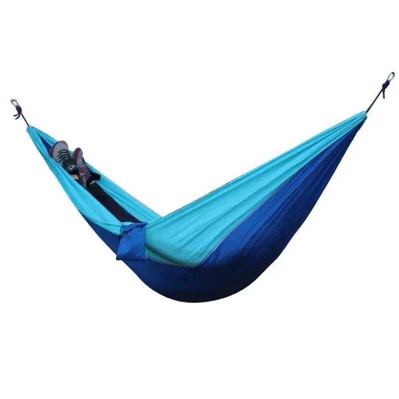 Mandotos Adventure Hammock Pack showing a lightweight nylon hammock with storage bag ready for outdoor camping and hiking.