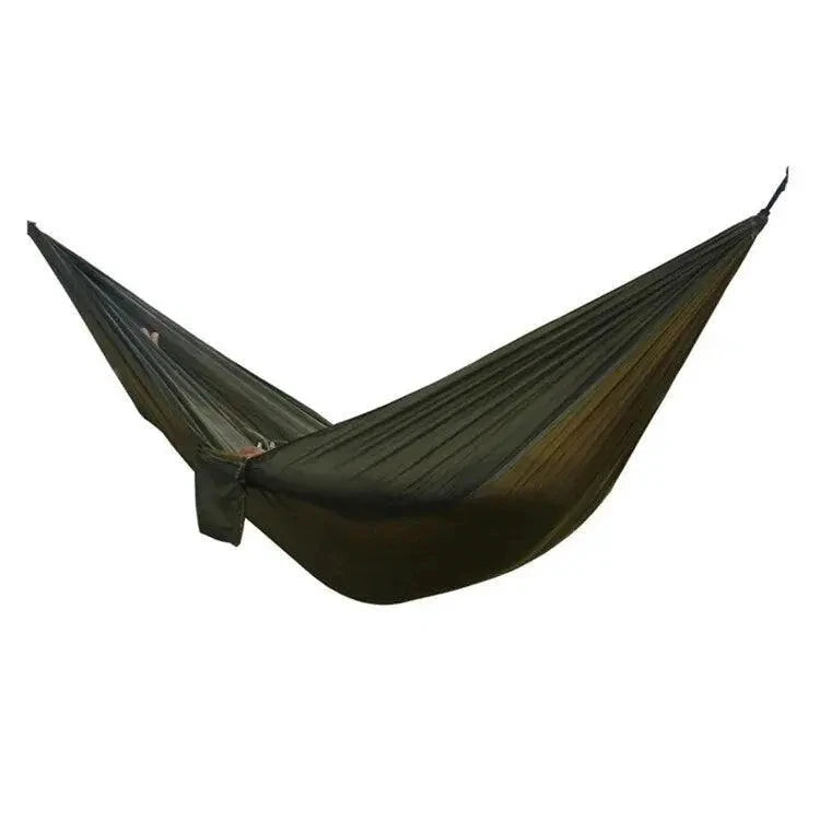 MANDOTOS Adventure Hammock Pack with lightweight nylon hammock, straps, and carabiners for outdoor camping and relaxation.