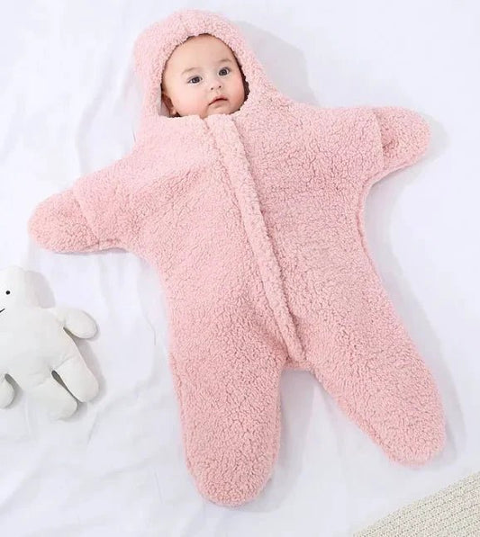 Soft baby quilt by MANDOTOS featuring colorful patterns, perfect for cuddling and keeping your little one cozy.