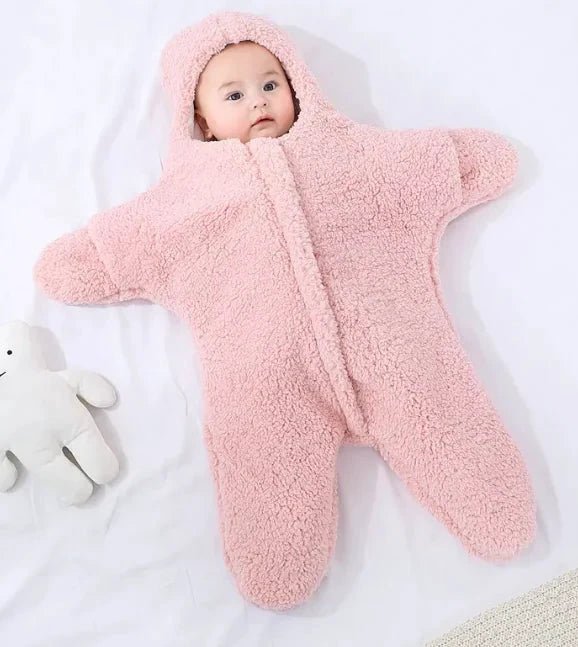 Soft baby quilt by MANDOTOS with colorful, cozy fabric, perfect for nurseries and baby comfort.