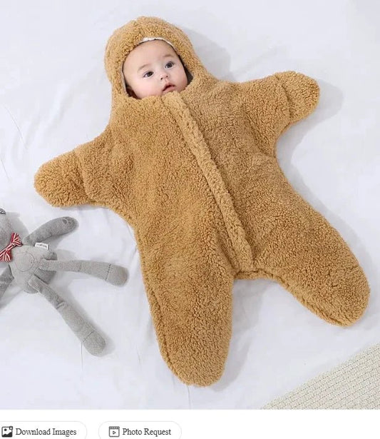Soft baby quilt by MANDOTOS featuring colorful patterns and cozy fabric, perfect for nursery or stroller use.