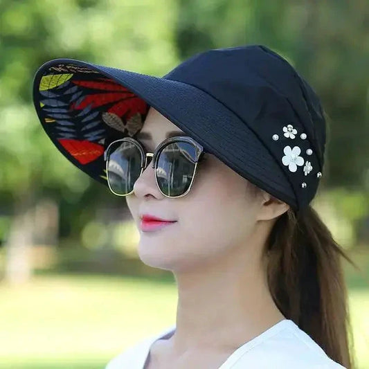 Mandotos Breezy Pearl Visor Hat with wide brim and pearl accents, perfect for sun protection and stylish outdoor wear.