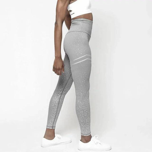Mandotos chic gold print leggings featuring a stylish pattern, close-up view of the vibrant gold design on soft stretchy fabric.