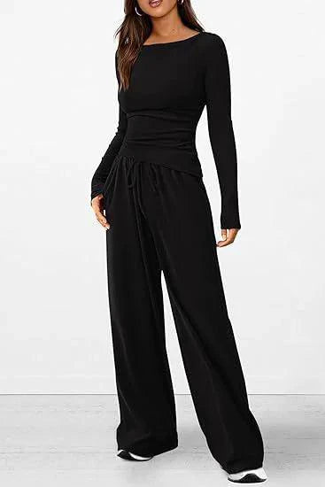 Mandotos chic long-sleeve trousers set featuring stylish top and matching trousers for a modern, elegant look.