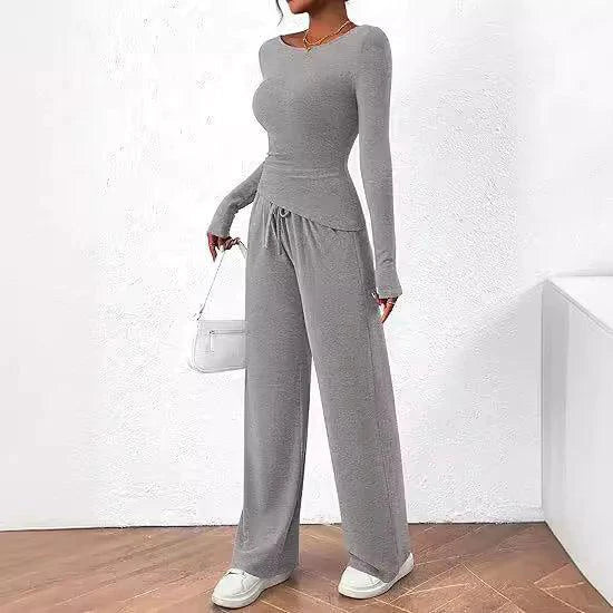 Mandotos chic long-sleeve trousers set featuring a stylish top and matching pants, perfect for a modern, sophisticated look.