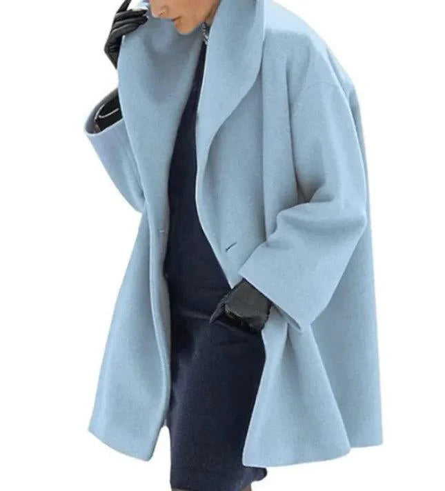 Mandotos chic multi-shade oversized cardigan featuring a relaxed fit and colorful knit pattern, perfect for casual and cozy wear.