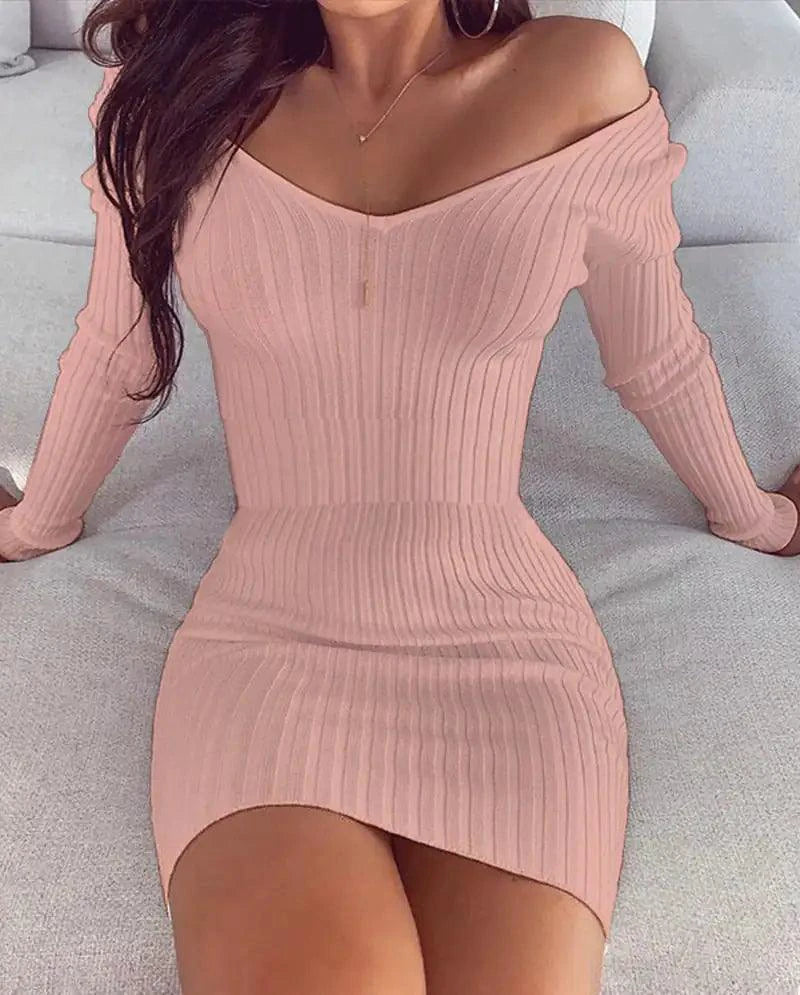 Mandotos chic off-shoulder knit dress featuring a stylish, relaxed fit perfect for casual or semi-formal occasions.