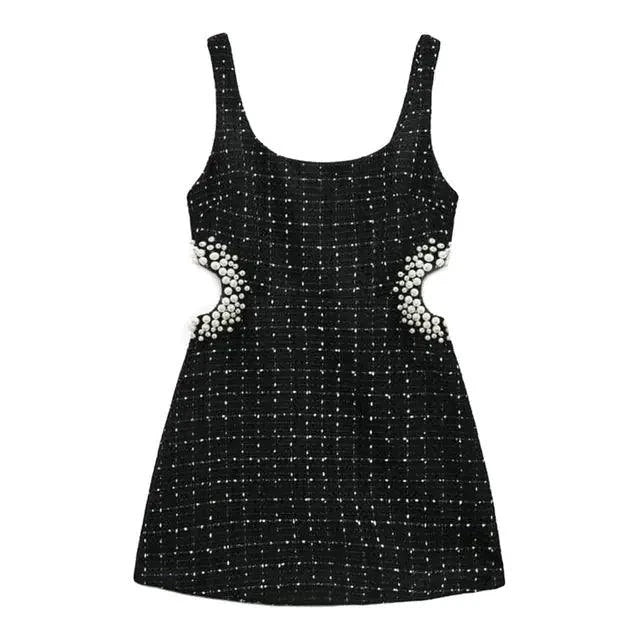 Mandotos chic off-shoulder mini dress featuring a stylish design and fitted silhouette, perfect for trendy summer occasions.