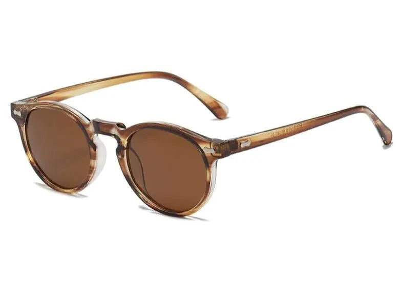 Mandotos chic round UV-block sunglasses with black frames and dark lenses, stylish and protective for sun wear.