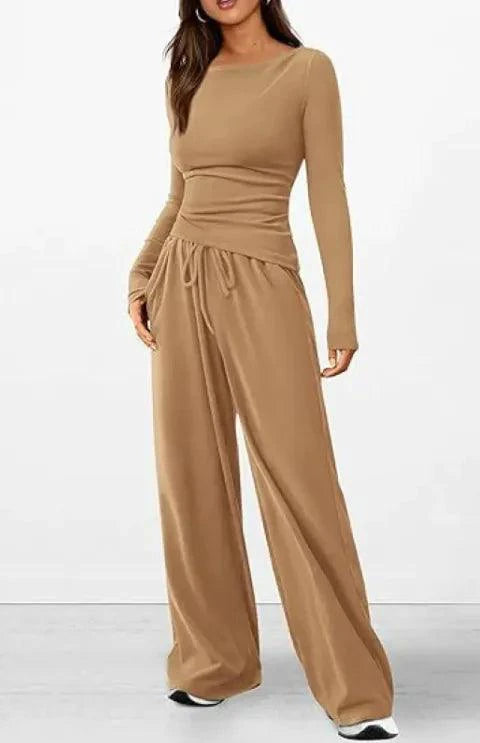 Mandotos City Comfort Asymmetrical Ensemble featuring a stylish, modern design with layered fabric and neutral tones.