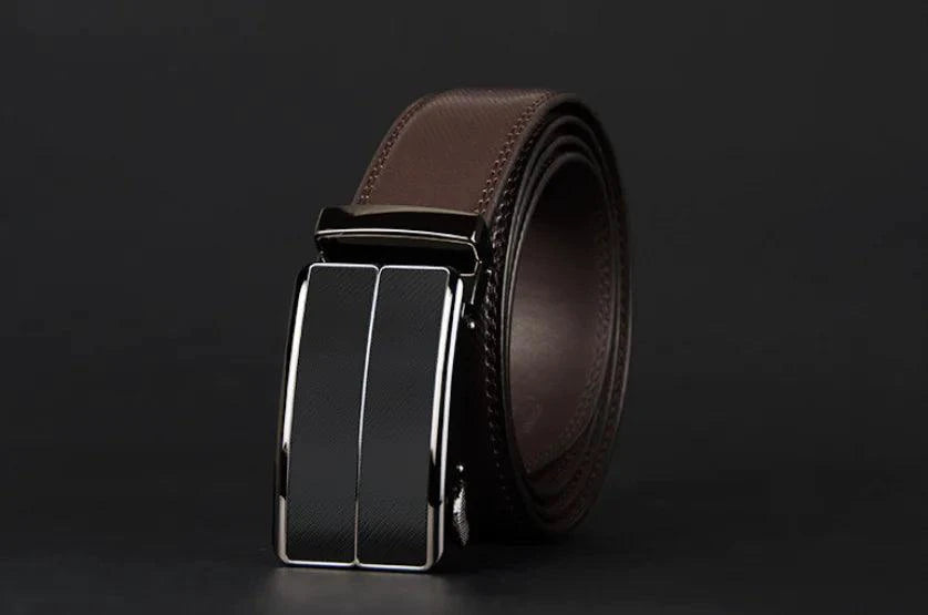 Mandotos contemporary leather belt featuring a sleek, smooth brown strap and a modern metal buckle for casual or formal wear.