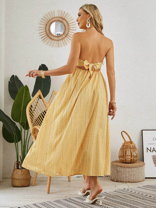Mandotos bohemian halter maxi dress for women, sleeveless and flowy, perfect for summer beachwear and casual occasions.