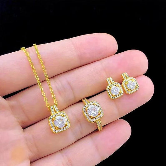 Mandotos fashion jewelry set with zircon gem necklace, matching earrings, and ring on a white background