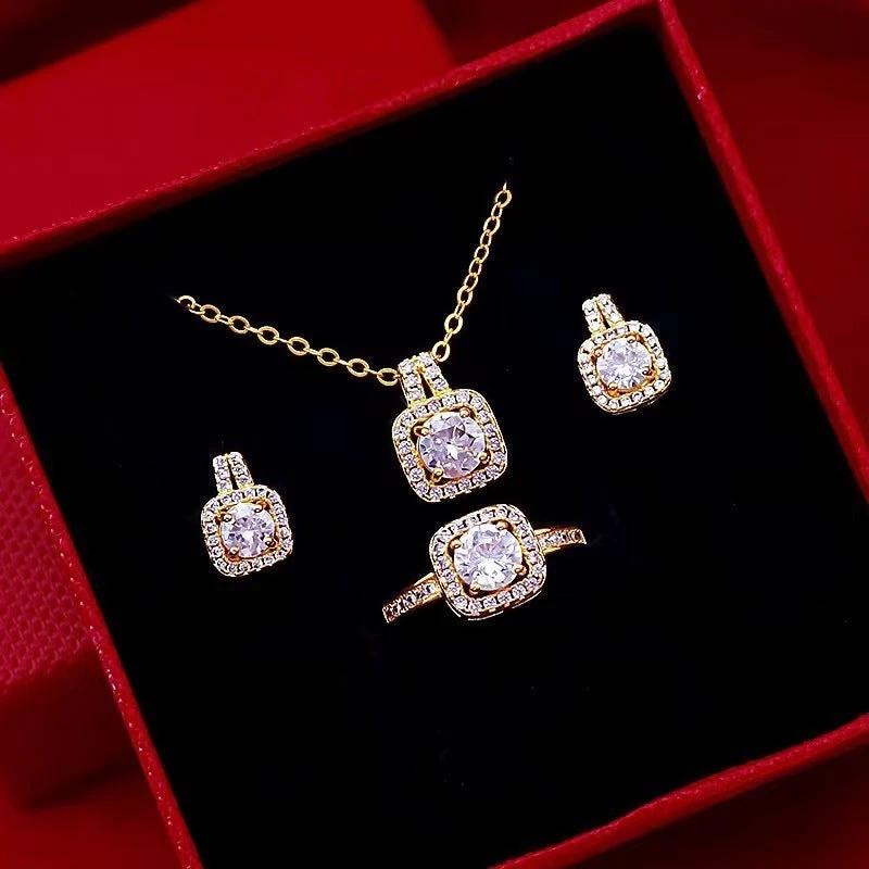 Mandotos fashion jewelry set with zircon gem necklace, matching earrings, and ring, featuring elegant silver-toned design