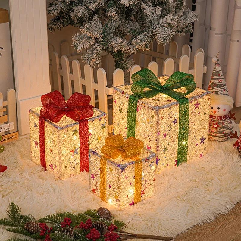 Lighted Christmas gift box with bow from MANDOTOS, outdoor luminous decoration for festive holiday display.