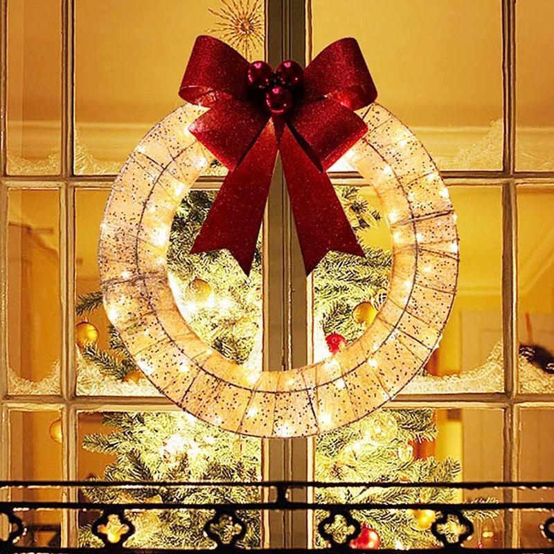 Mandotos Christmas wreath with luminous LED lights, metal garland, and bowknot for front door decoration, 50cm diameter.