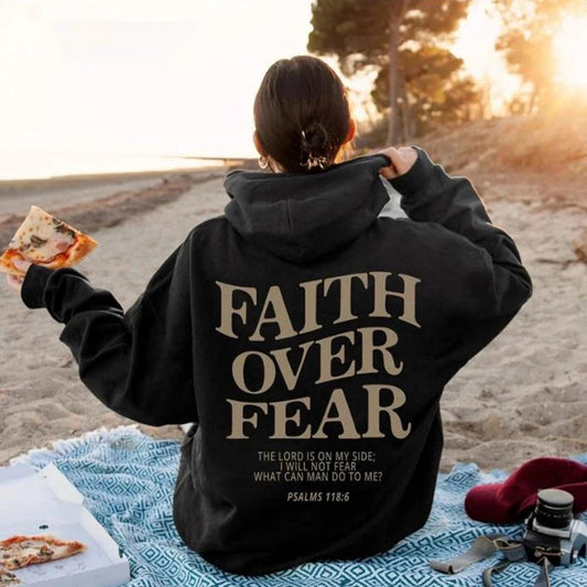 Unisex brown Christian hoodie by Mandotos featuring faith over fear message and Psalm 118:6 Bible verse design.