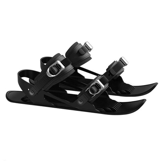 Mandotos Mini Ski Skates, portable and adjustable short skiboard for snow, shown in use on snowy terrain.