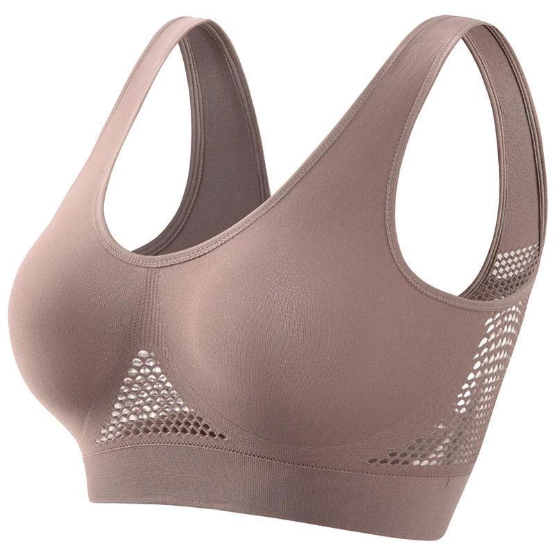 Plus size women's push-up sports bra by MANDOTOS, ideal for running and yoga, with supportive design and comfortable fit.