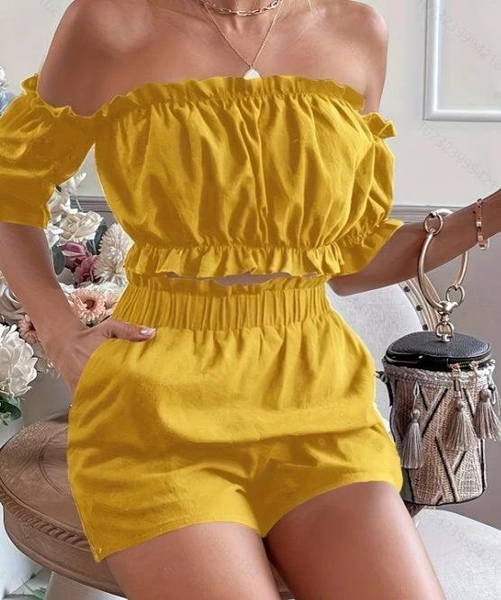 Two-piece women's short sleeve shorts set by MANDOTOS, featuring comfortable casual tops and shorts for warm weather.