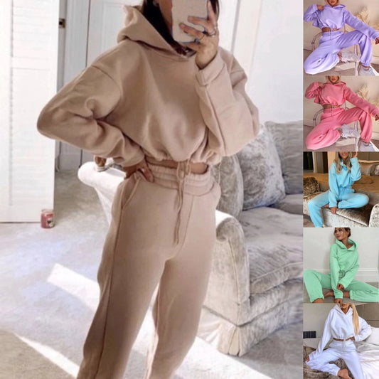 Women's 2-piece jogging suit by MANDOTOS featuring a sexy long sleeve hoodie and matching pants for active wear.