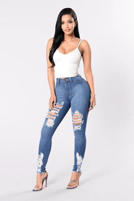 Mandotos denim pencil pants for women featuring slim fit, ripped holes, stretch fabric, and long tapered legs.