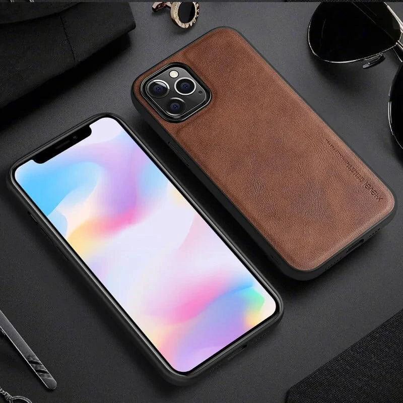 Elegant leather iPhone shield by MANDOTOS with smooth leather finish and precise cutouts for a stylish phone protection.