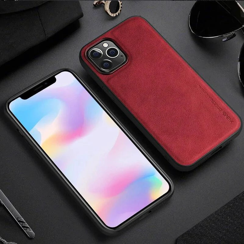 Elegant leather iPhone shield by MANDOTOS showing a slim, stylish protective case with smooth leather finish and precise cutouts.