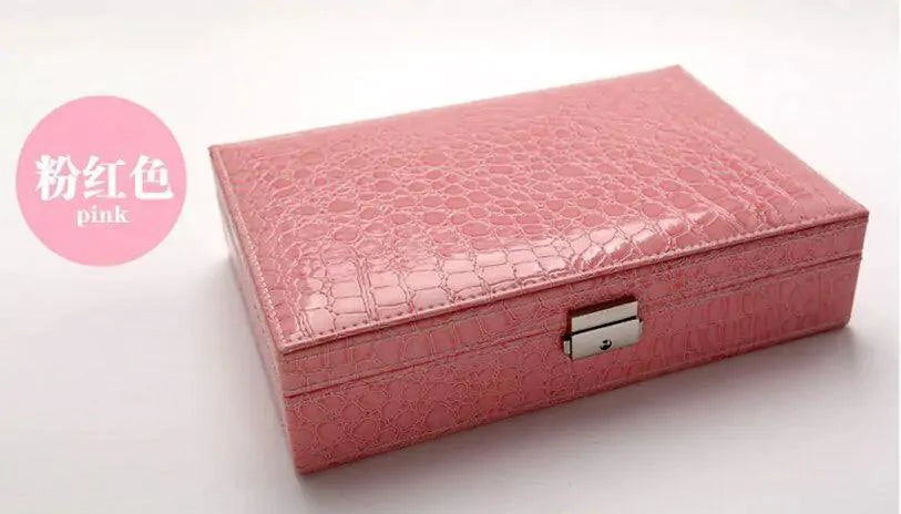 Elegant leather vanity case by MANDOTOS featuring a classic design with a sturdy handle and secure clasps.