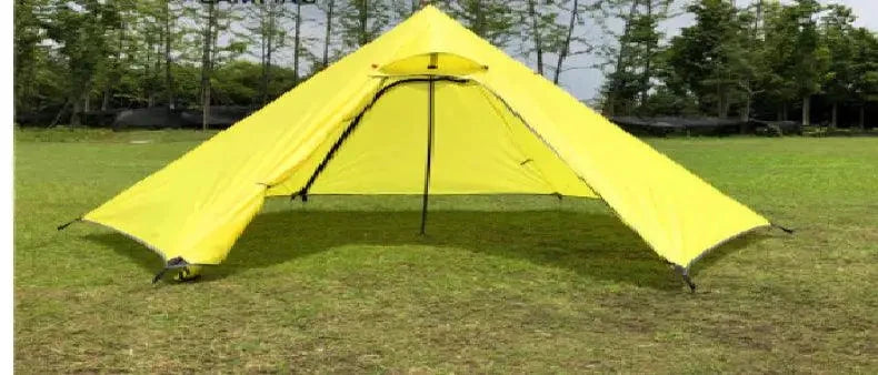 Mandotos Featherlight Pyramid Camp Shelter set up outdoors, showcasing lightweight design and durable fabric for camping adventures.