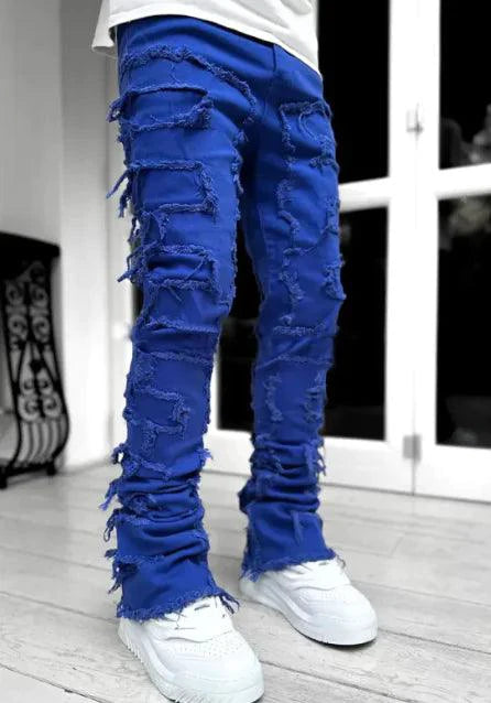Mandotos FlexiStyle denim jeans showing slim fit design, classic blue wash, and five-pocket style on a model.